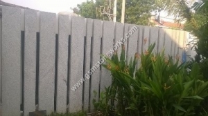 Stone compound wall (24) 